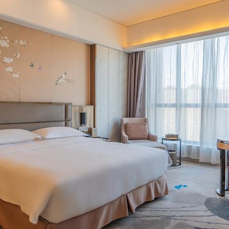 Li Cai Tian Qi Hotel XIY Extérieur photo