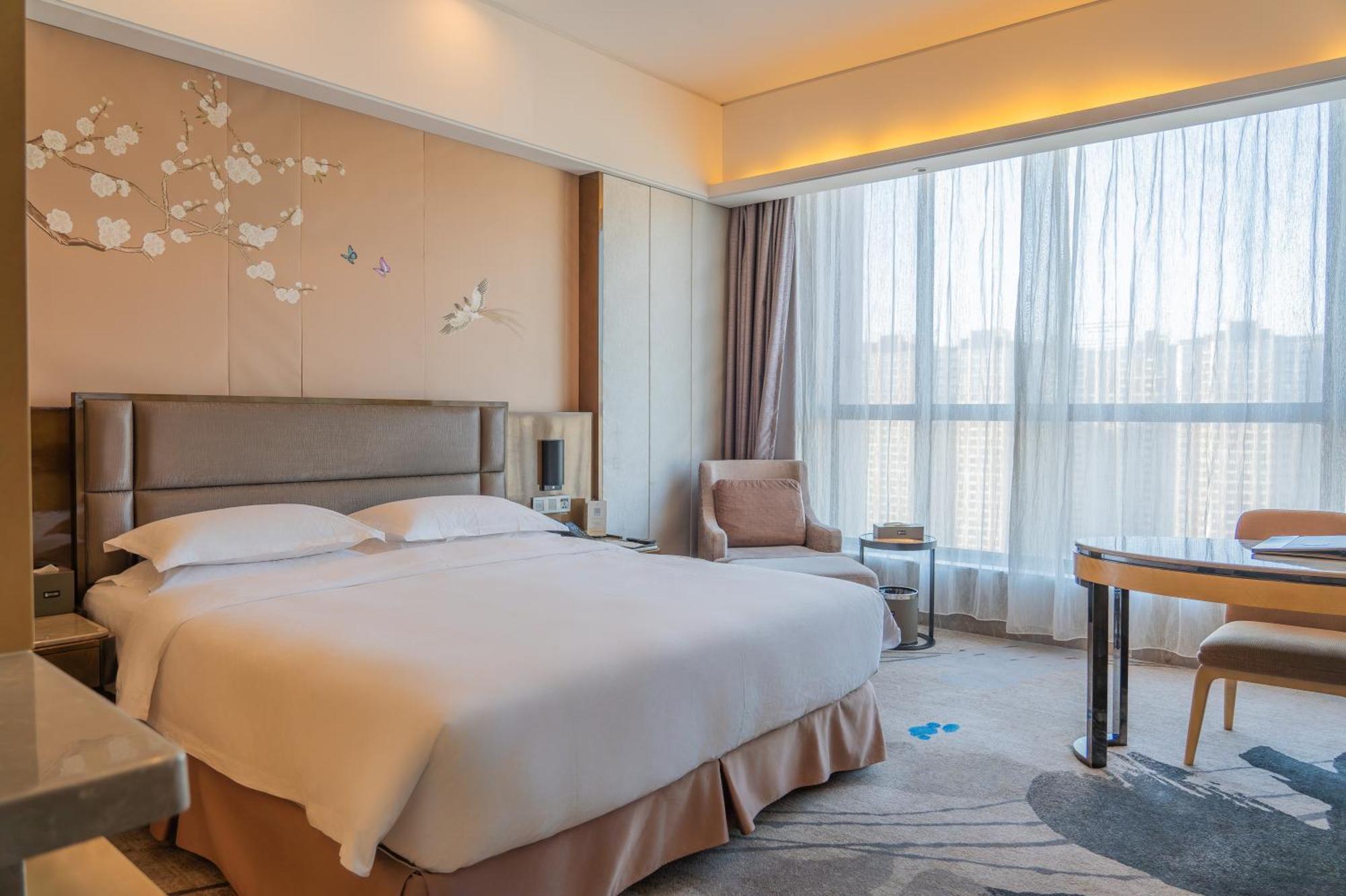 Li Cai Tian Qi Hotel XIY Extérieur photo